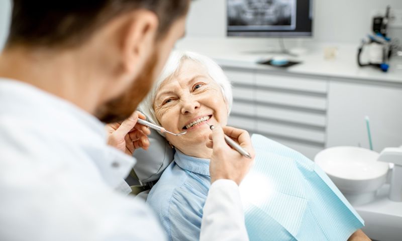 Mature lady getting a dental check-up at GMHBA Dental care