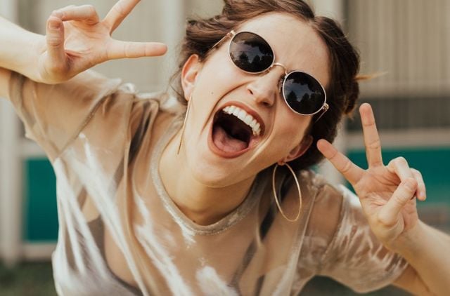 Young woman saving on her health insurance using her young adult discount