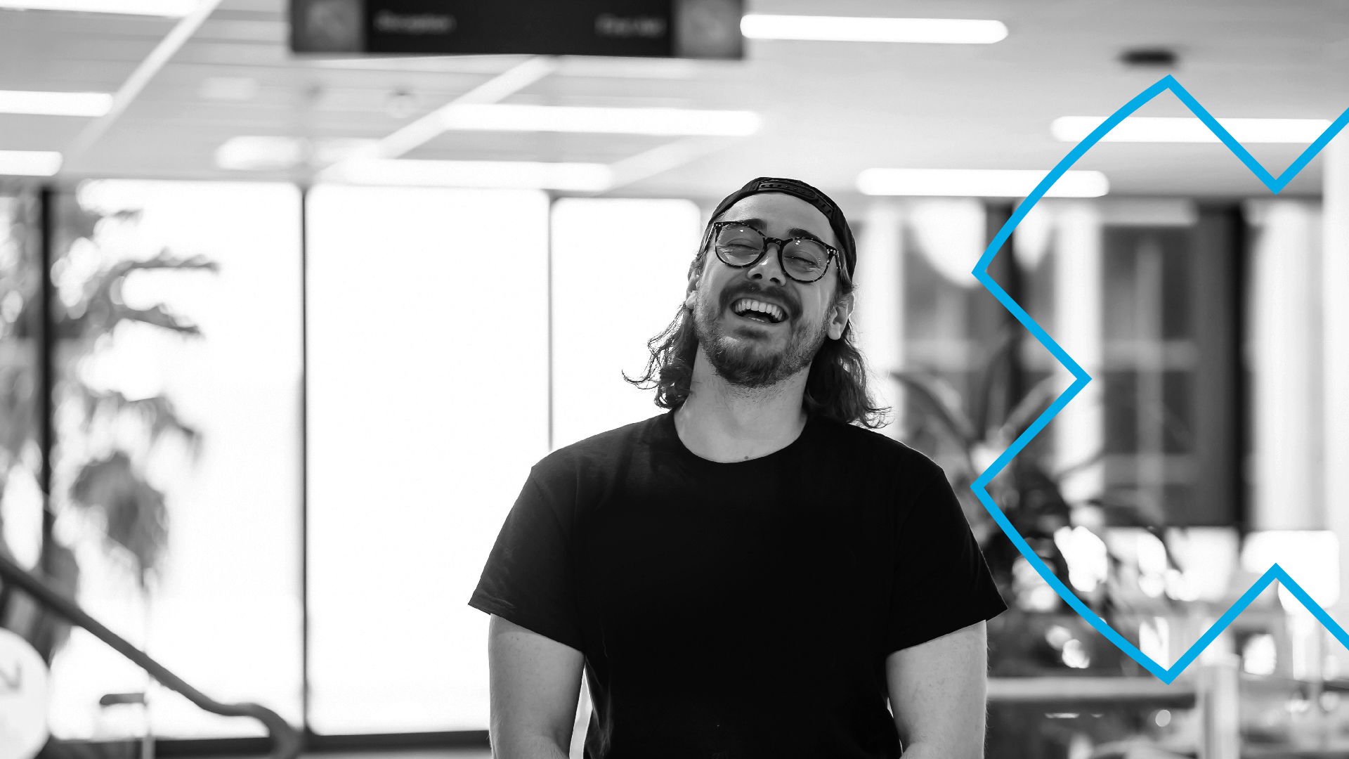 Young male worker in modern office