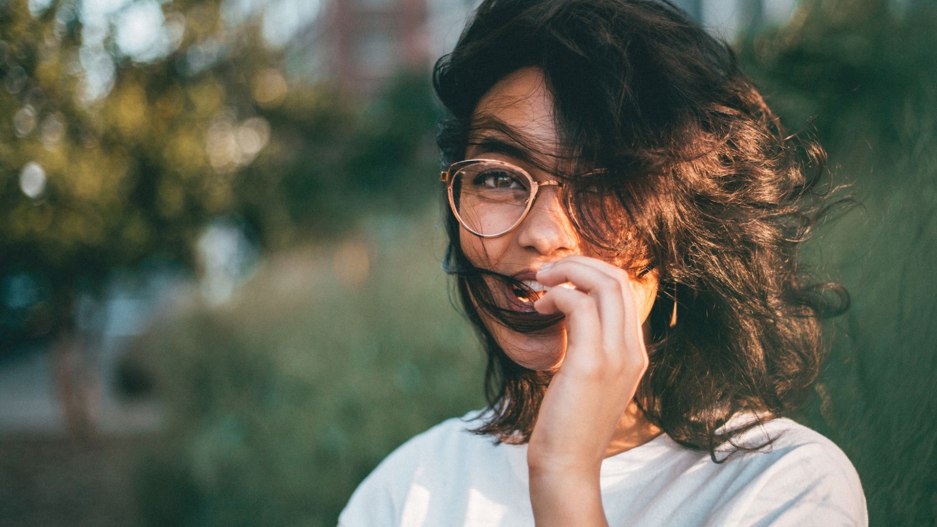 Woman in sun wearing sunglasses.jpg