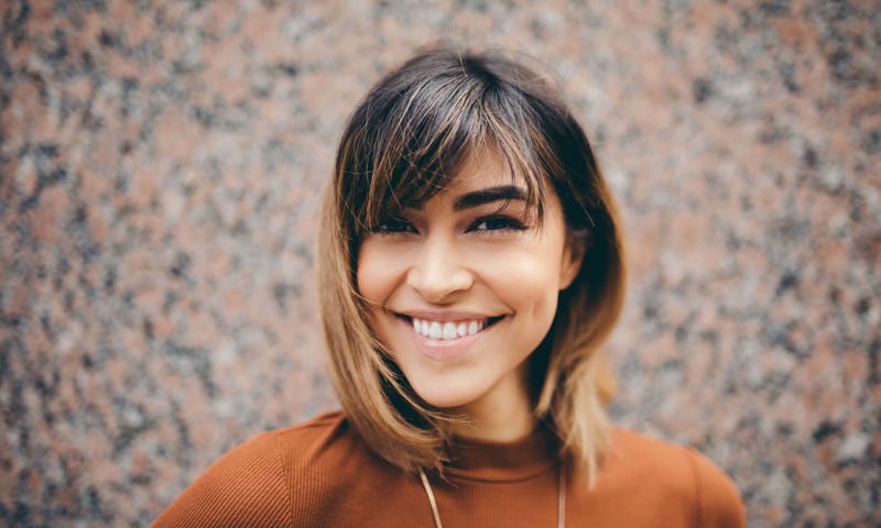 Woman smiling looking at the camera