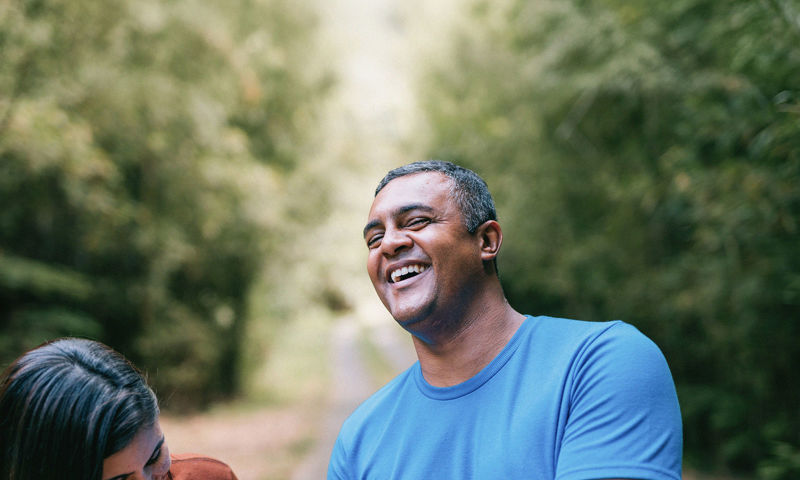 Man walking and laughing