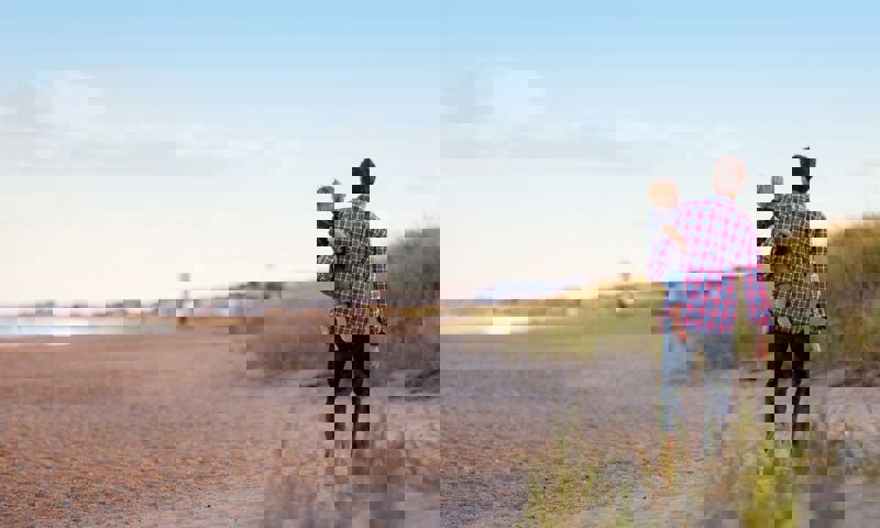 A father and son at the beach