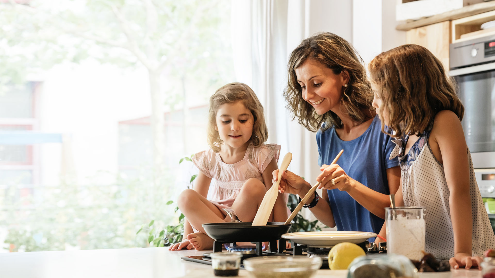 Mother and daughters spending time together