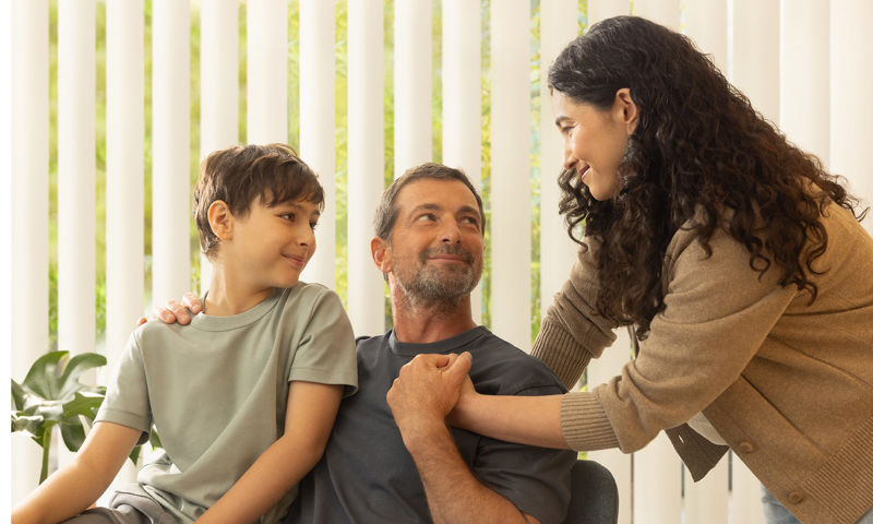 Family covered by GMHBA Health Insurance sharing a moment in hospital