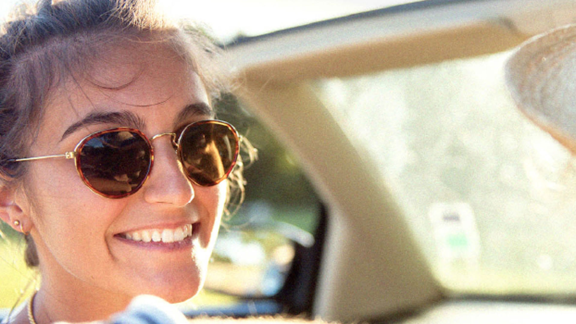 Couple soaking up the summer sun on a road trip