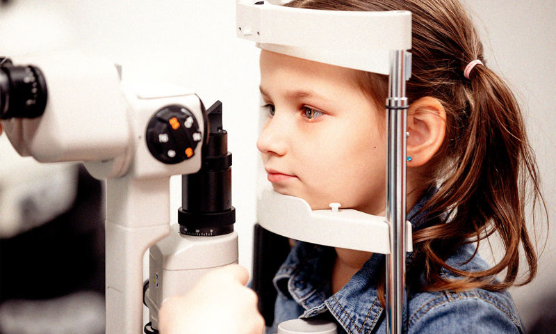 Young girl getting her eyes tested at GMHBA Eye Care