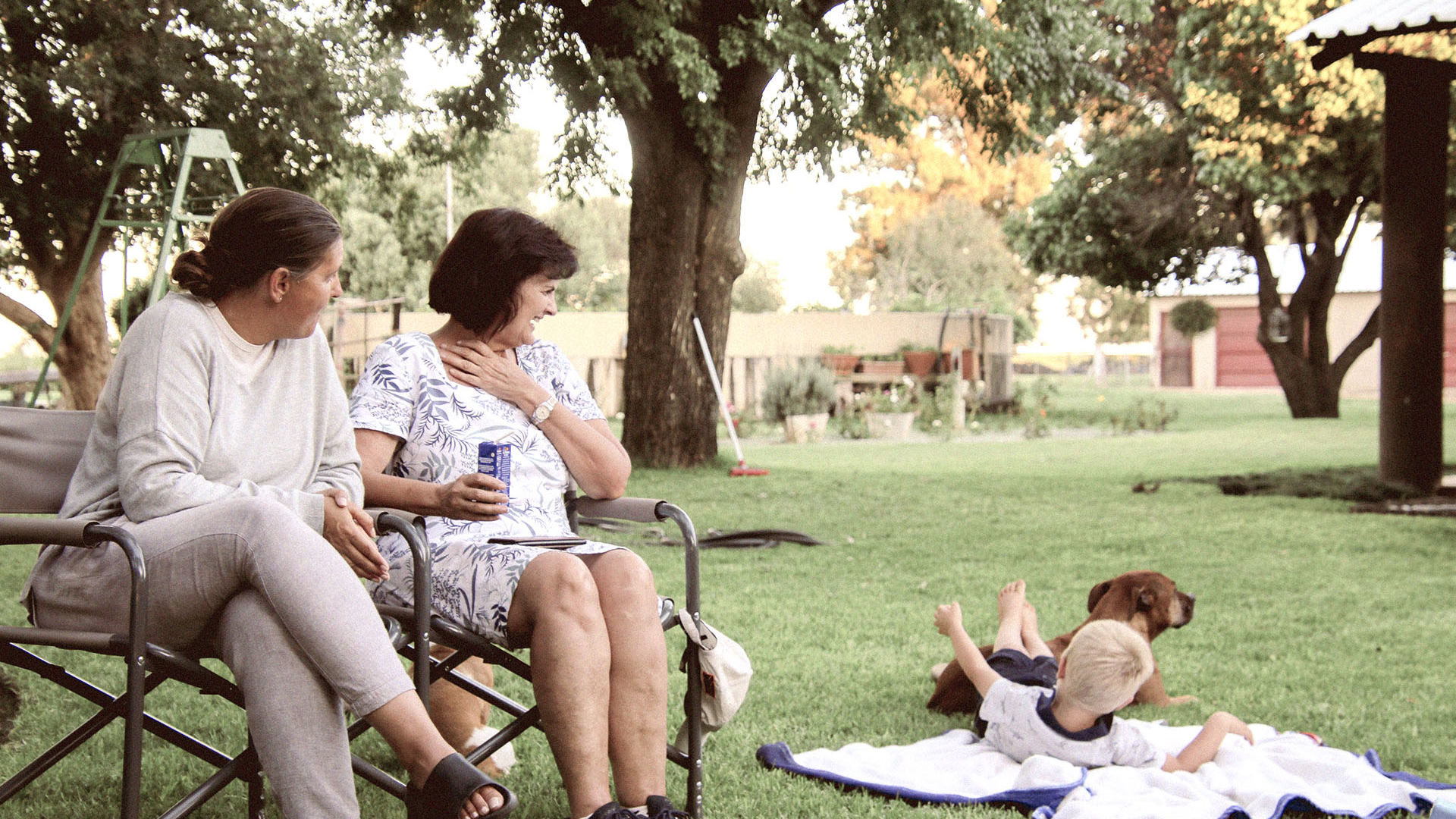 three generations of GMHBA members relaxing in the park