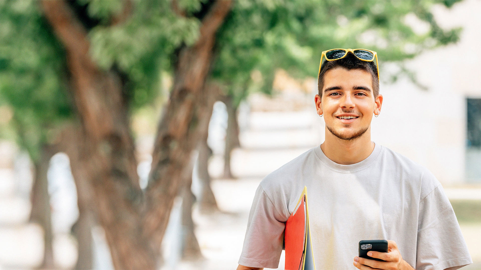 Male between the age of 18 and 25 learning about getting a discount on his hospital cover with GMHBA
