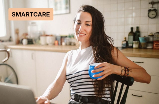 Woman looking up her fact sheet for GMHBA Everyday SmartCare Extras 