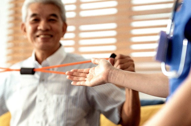 Man using exercise band