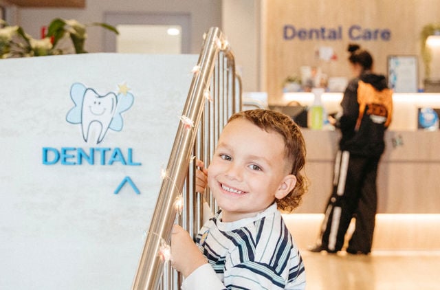 Boy smiling at GMHBA Hub dental