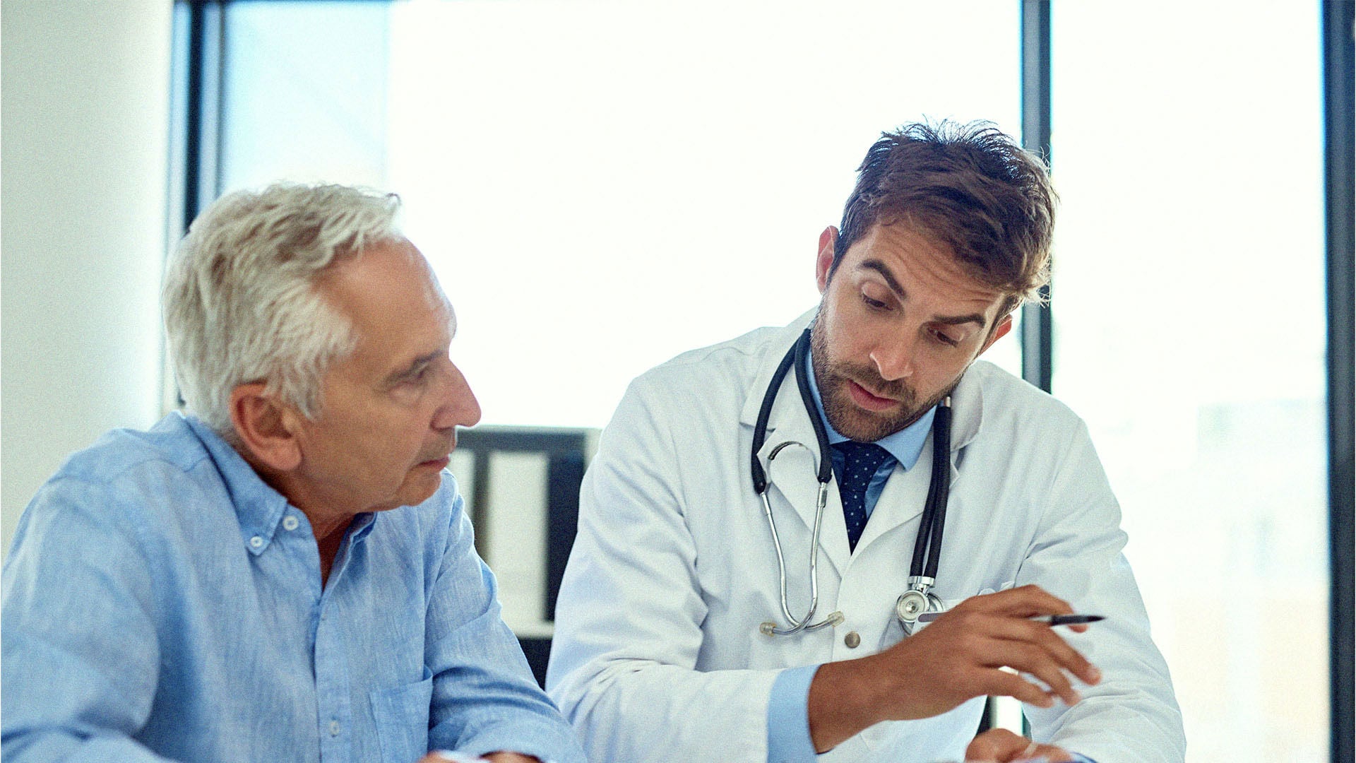 Doctor talking to patient about hospital discharge