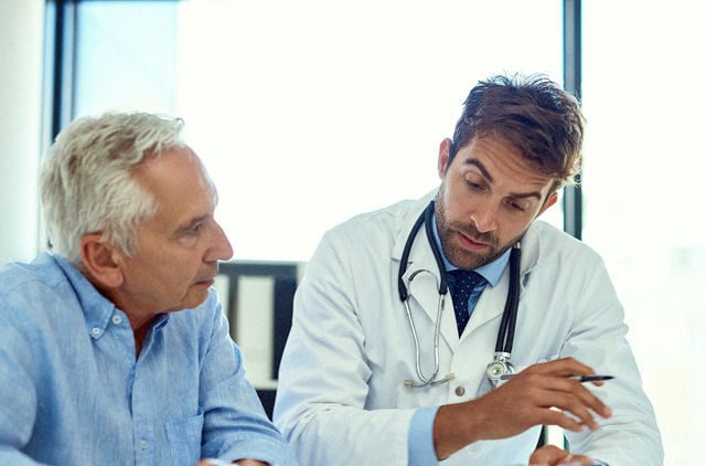 Doctor talking to patient about hospital discharge