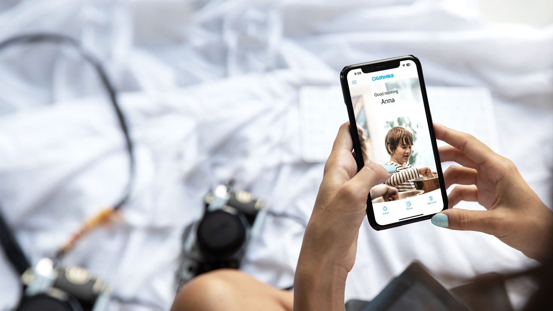 Person looking at GMHBA app on phone screen