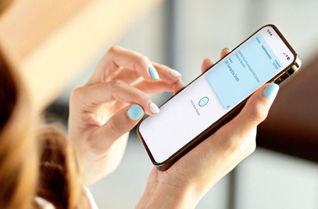 Person looking at GMHBA member area on their phone
