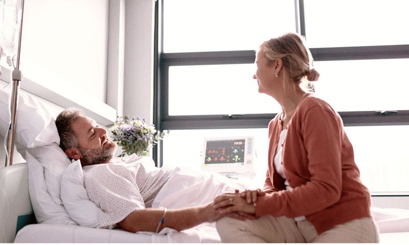Wife visiting husband in hospital