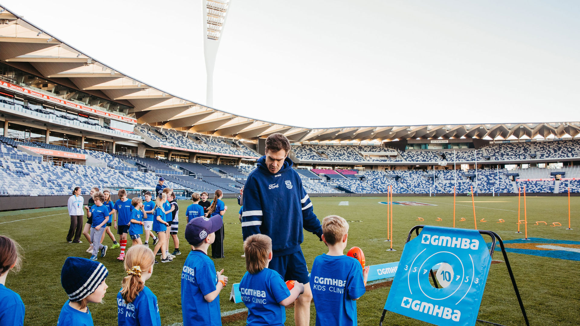 Geelong foortball player Jeremy Cameron at the Cats junior clinic