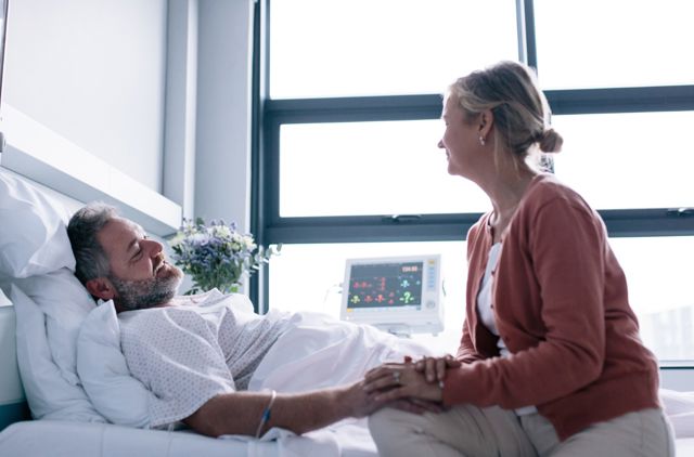 Wife visiting husband in private hospital